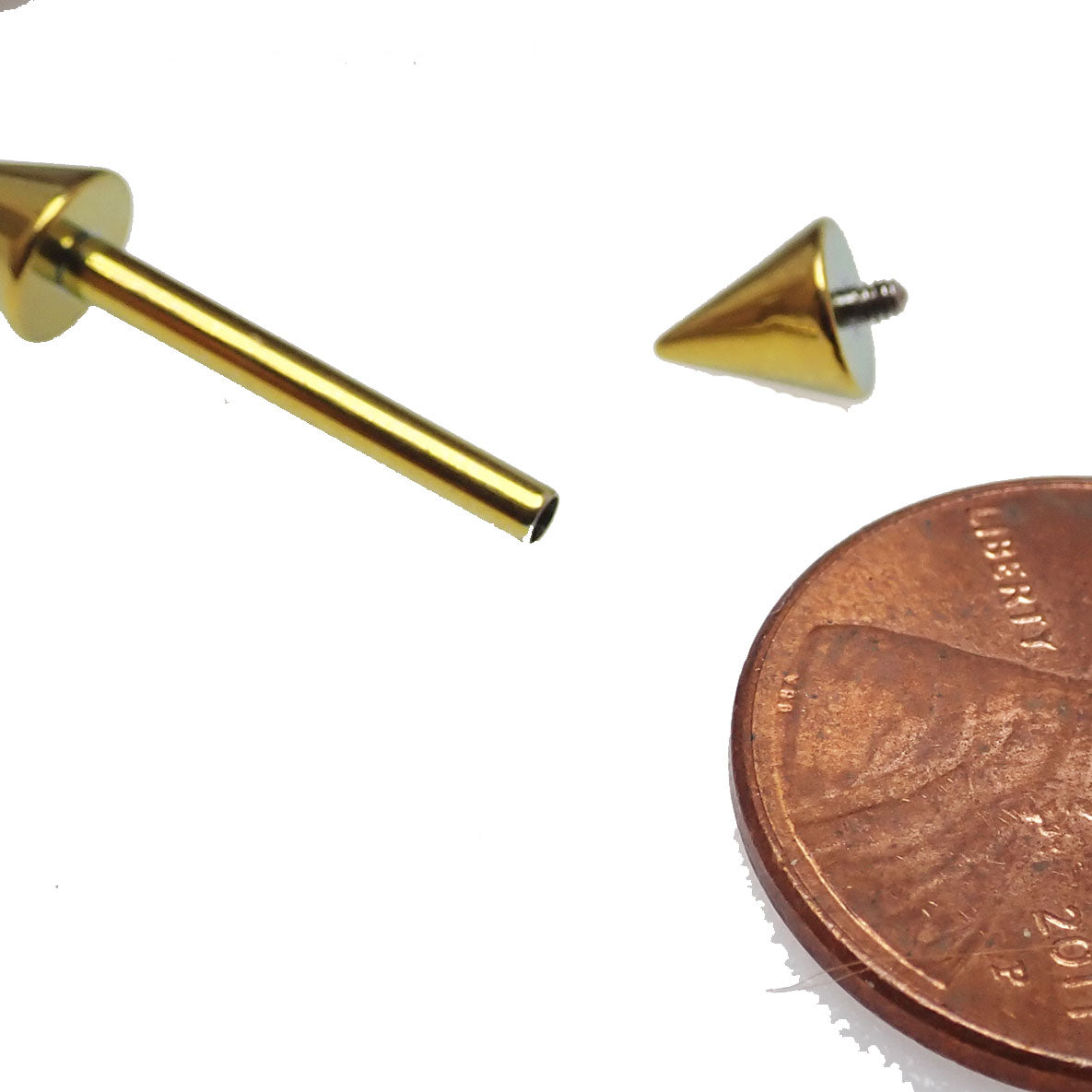 Internally threaded titanium barbell with cone spikes, 14g, from Body Clickers Body Jewelry, featuring a sleek, spiked design for piercing jewelry