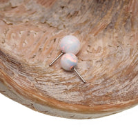 White opal push fit ball attachment for body jewelry by Body Clickers, 4mm, featuring a smooth, shiny white opal stone.