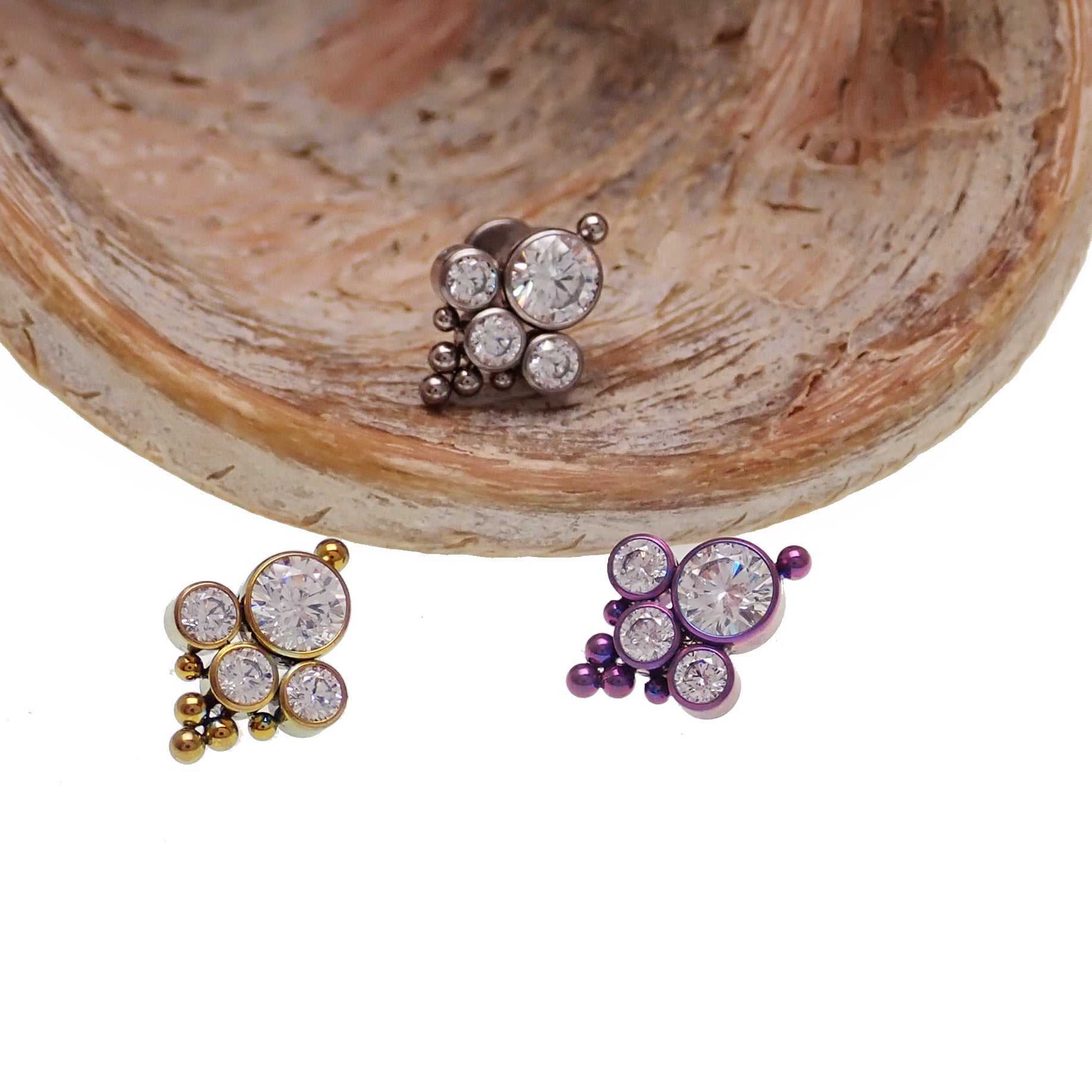 Body Clickers clear CZ and beaded multi-cluster flat back body jewelry in 14g to 20g sizes, featuring sparkling stones and intricate design.