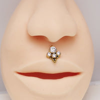 Body Clickers Medusa lip piercing with clear CZ stones and beaded clusters in 14g to 20g body jewelry style.