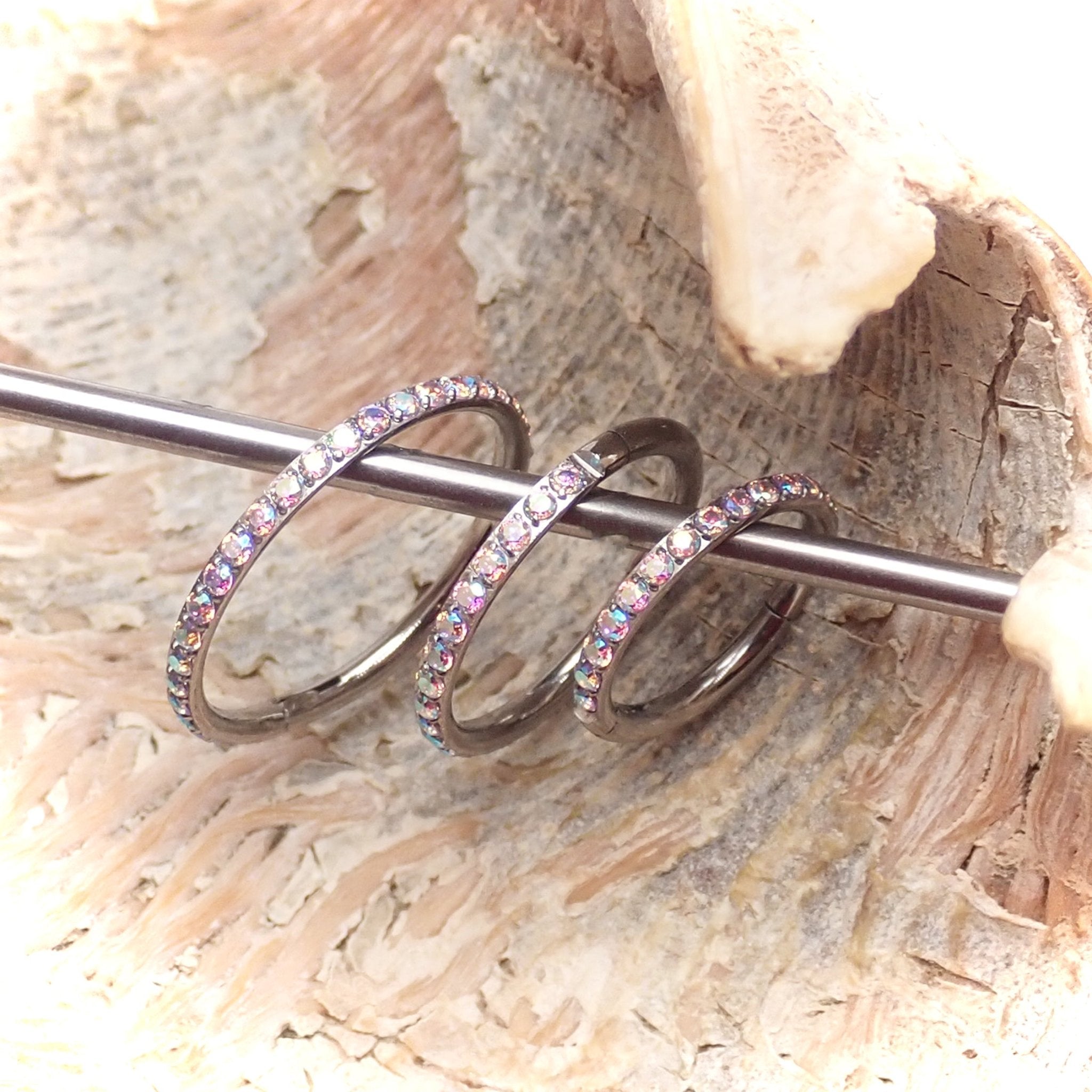 Sparkly titanium CZ clicker body jewelry by Body Clickers, 16g, featuring a 6mm AB sparkle design for piercings