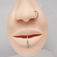 Sparkly titanium CZ clicker body jewelry in 16g with 6mm AB stones, designed by Body Clickers for piercing adornment.