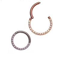 Aurora Borealis CZ titanium clicker body jewelry in 16g, featuring sparkling colorful stones and sleek titanium design.