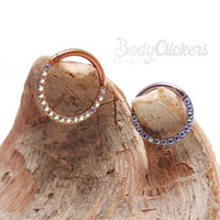 Aurora Borealis CZ titanium clicker body jewelry in 16g, featuring sparkling colorful stones and sleek titanium design.