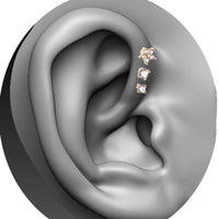 Gold push fit flower body jewelry with CZ stones and Bio-Flex stems, designed for secure, comfortable body piercing.