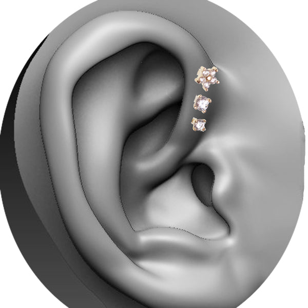 Gold push fit flower body jewelry with CZ stones and Bio-Flex stems, designed for secure, comfortable body piercing.
