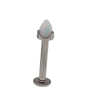 Yellow labret bar with fire opal spike and cone, 14g body jewelry by Body Clickers, featuring a sleek moon design.