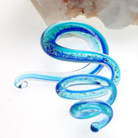 Pair of blue glass ear spirals body jewelry from Body Clickers, 6mm size, featuring smooth, curved glass designs for pierced ears.