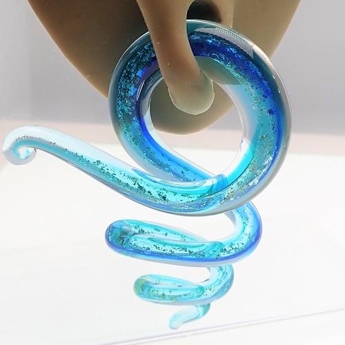 Pair of Body Clickers blue glass ear spirals, 6mm body jewelry for stretched earlobes, featuring smooth, rounded design and vibrant blue color.