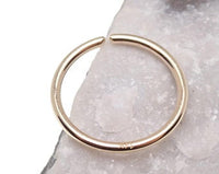 Solid 14K gold hoop body jewelry by Body Clickers, 6mm diameter, 18g gauge, suitable for body piercing.