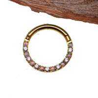 Titanium opal and crystal clicker body jewelry in 16g with a 6mm design, featuring colorful opal and clear crystal accents.