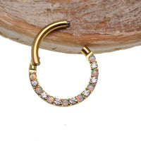 Titanium opal and crystal 16g clicker body jewelry with a sleek design and secure clasp.