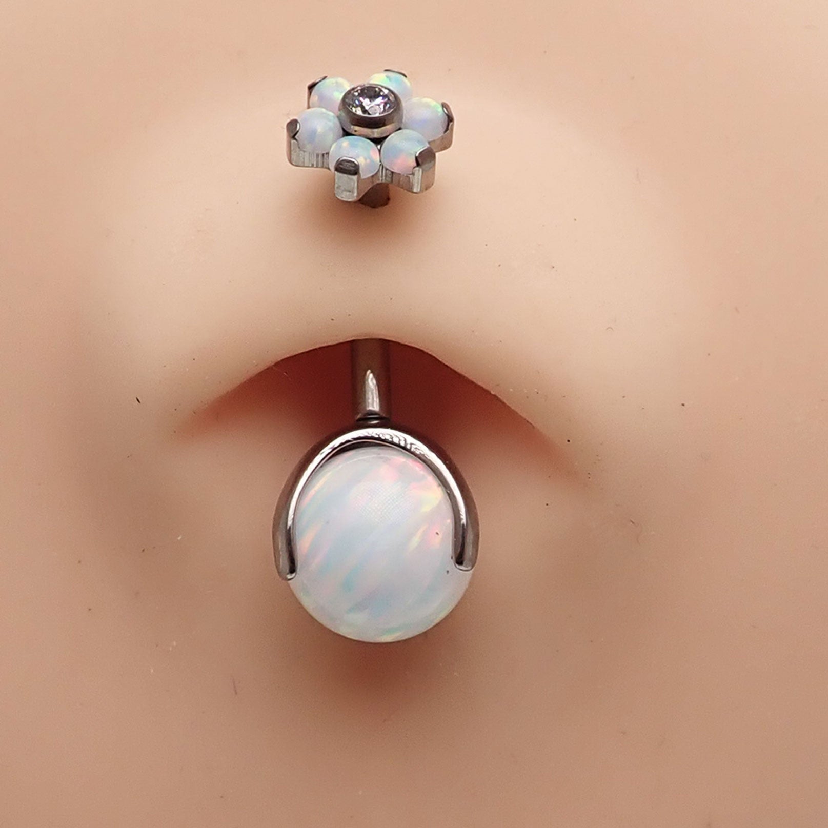 Titanium sun and ice white opal flower belly ring with floral design from Body Clickers Body Jewelry.