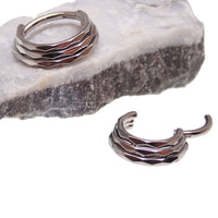 3-stack beveled titanium clicker body jewelry in 16g, featuring a sleek design with three interconnected beveled segments.