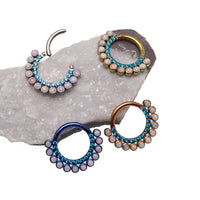 Blue zircon and white fire opal titanium clicker body jewelry, 16g, with 8mm stones, from Body Clickers.