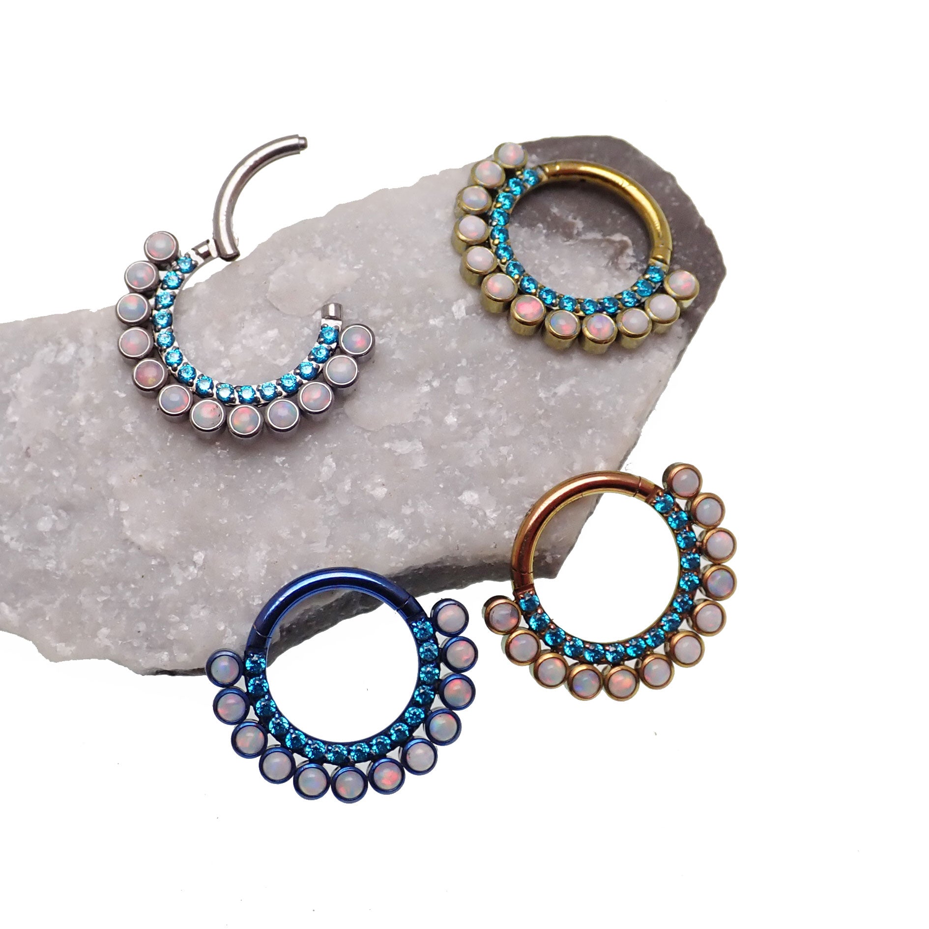 Blue zircon and white fire opal titanium clicker body jewelry, 16g, with 8mm stones, from Body Clickers.