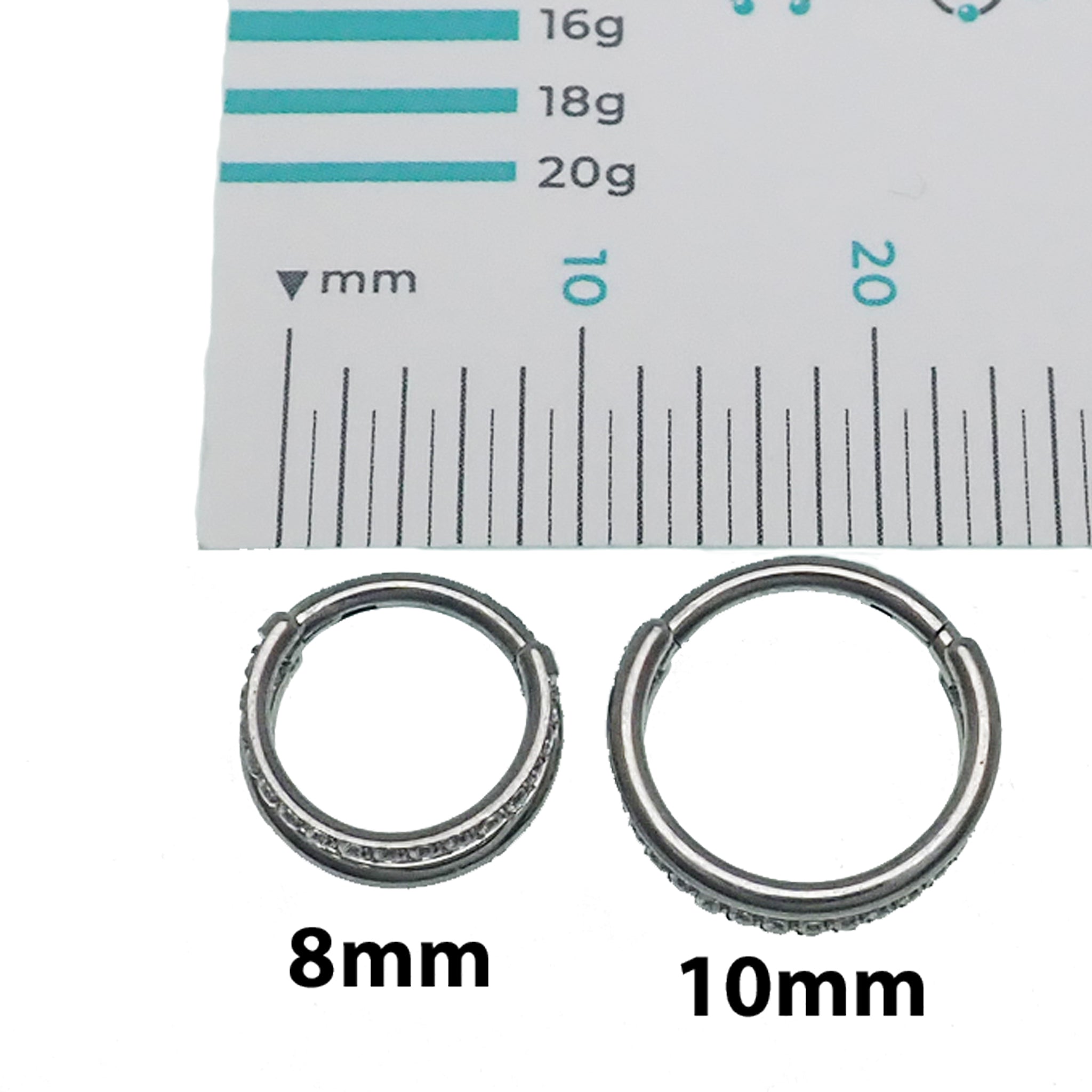 Clear CZ double row titanium clicker body jewelry in 16g with sparkling stones and sleek design, suitable for piercings.