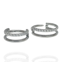 Clear CZ double row titanium clicker body jewelry in 16g with secure clicker closure, designed for comfortable wear and stylish look.