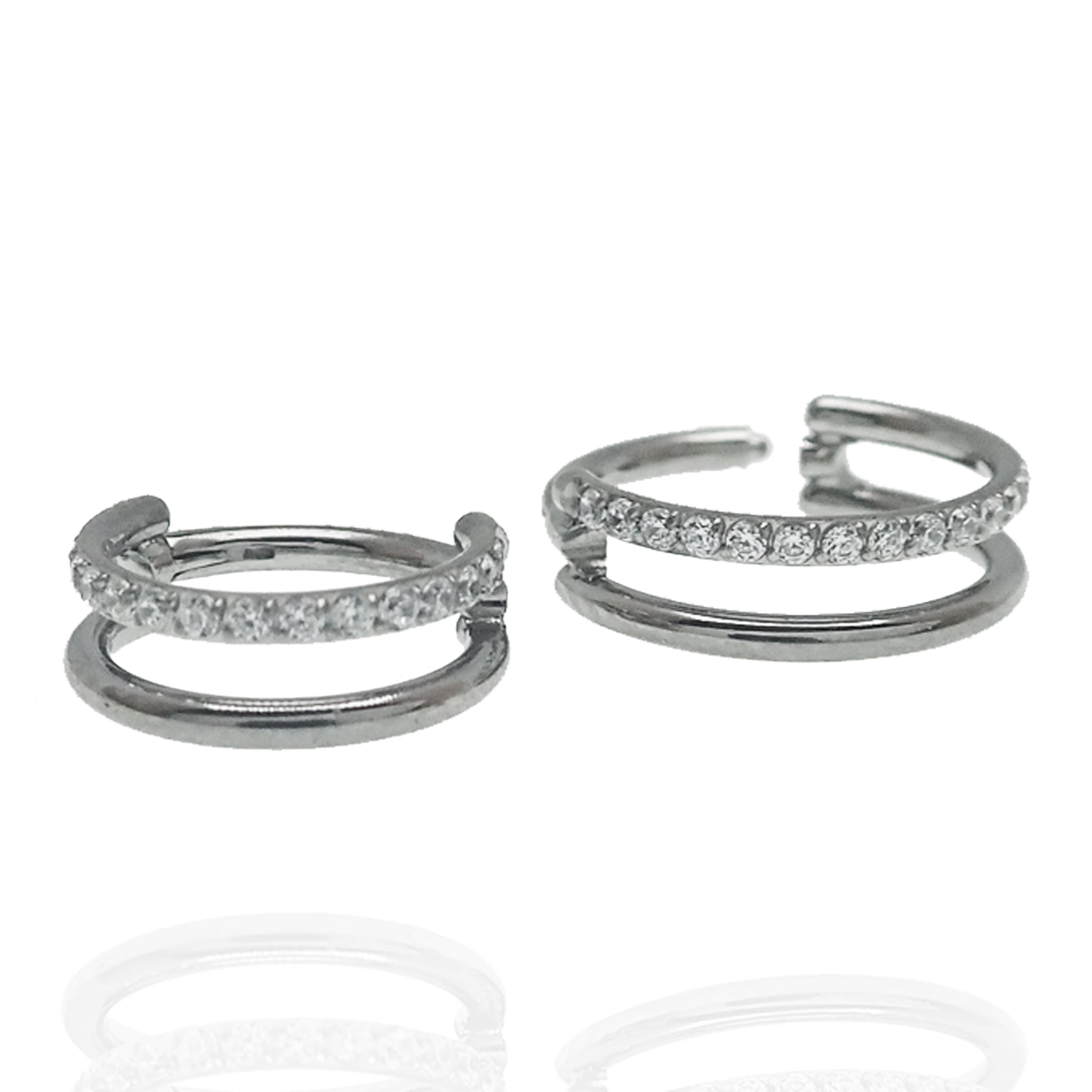 Clear CZ double row titanium clicker body jewelry in 16g with secure clicker closure, designed for comfortable wear and stylish look.