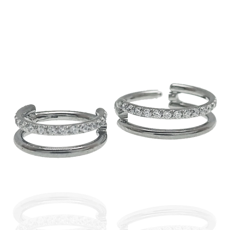 Clear CZ double row titanium clicker body jewelry in 16g with secure clicker closure, designed for comfortable wear and stylish look.