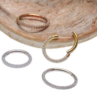 Hinged titanium clicker body jewelry with CZ stones, 16g size, shown from all sides for nose, septum, helix, and daith piercings.