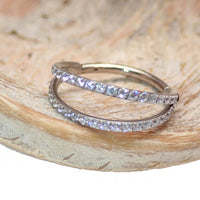 Double CZ clicker ring in 16g body jewelry with 8mm diameter, featuring sparkling cubic zirconia stones and sleek silver finish.