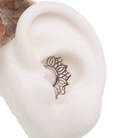 Filigree titanium clicker body jewelry in 16g with intricate design, featuring an 8mm opening for piercing accessories.