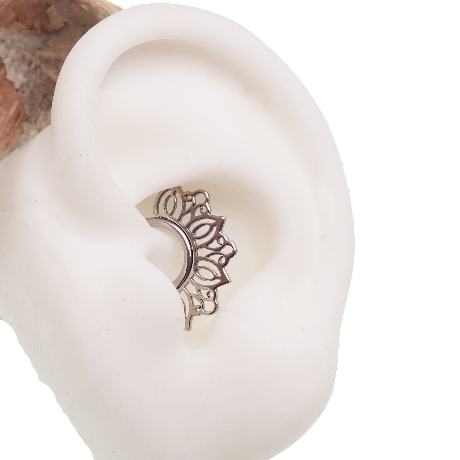 Filigree titanium clicker body jewelry in 16g with intricate design, featuring an 8mm opening for piercing accessories.