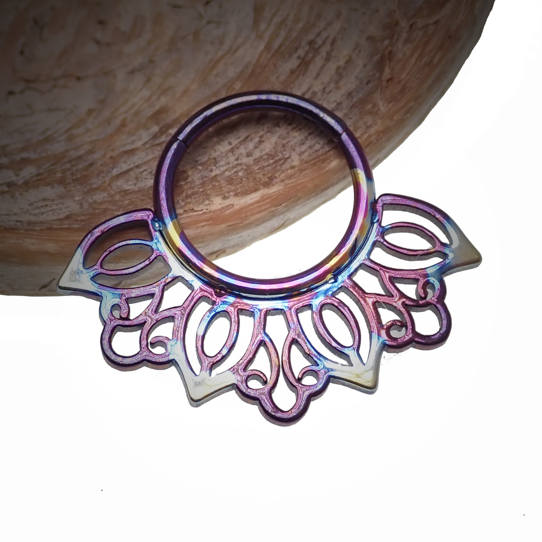 Filigree titanium clicker body jewelry in 16g with intricate design, made by Body Clickers, for ear or cartilage piercing.
