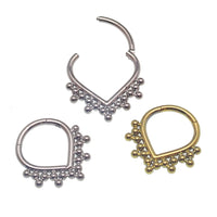 Heart-shaped beaded titanium clicker body jewelry in 16g with an 8mm width, featuring a stylish and comfortable design.