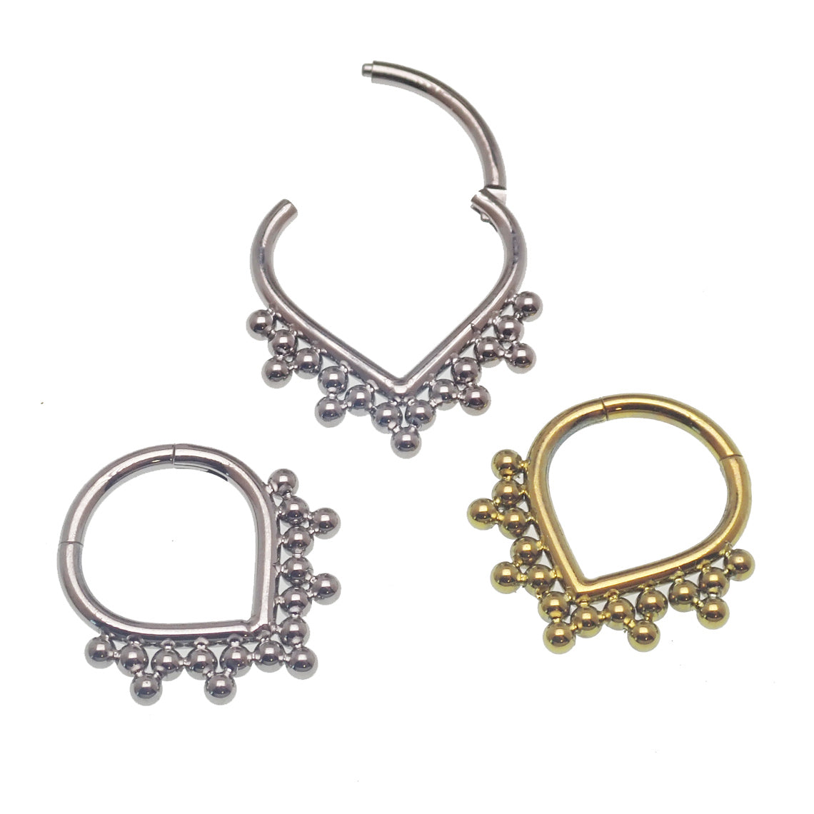 Heart-shaped beaded titanium clicker body jewelry in 16g with an 8mm width, featuring a stylish and comfortable design.