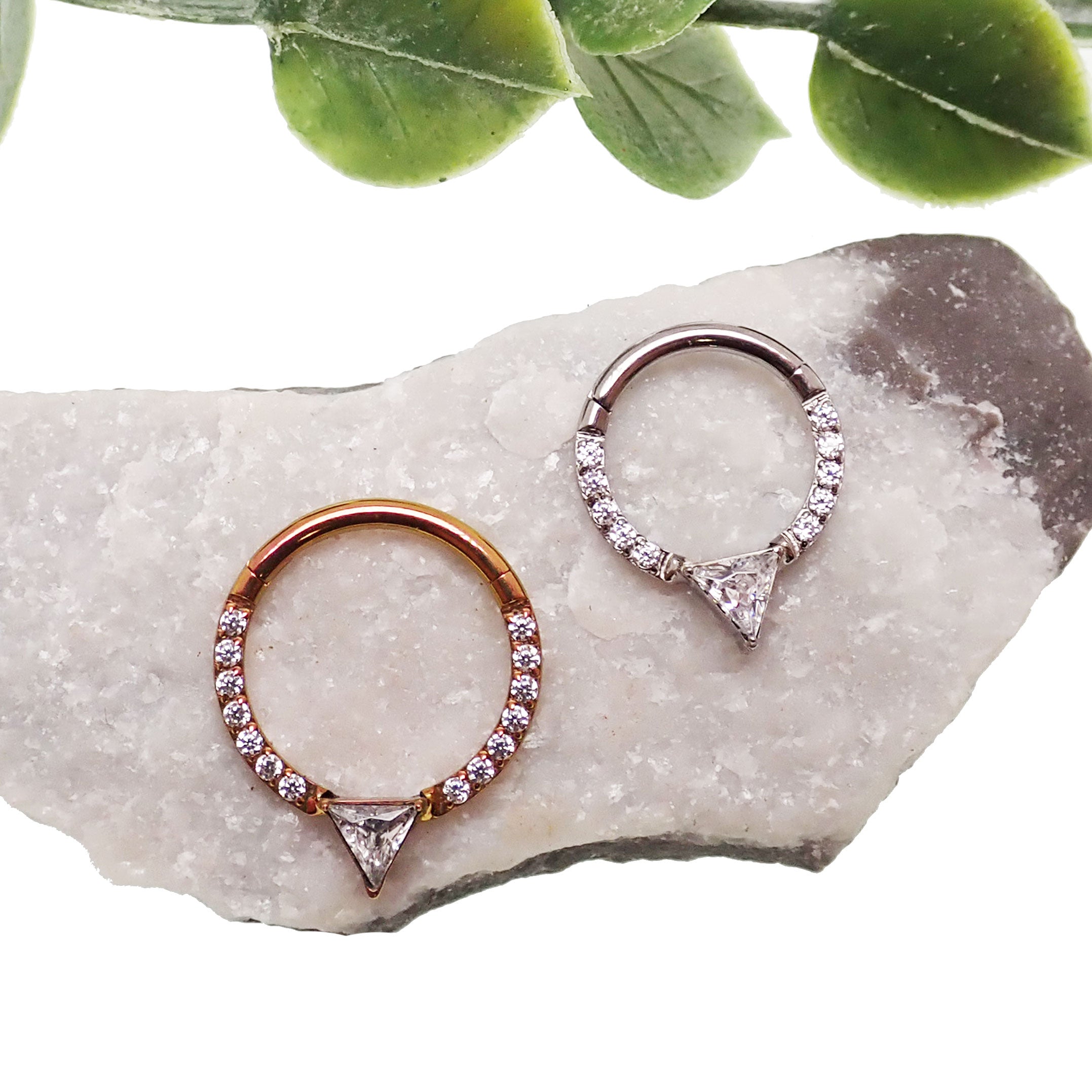 Hinged clicker body jewelry with 8mm triangle CZ for 16 gauge piercings, by Body Clickers, showcasing shiny metal and secure clasp.