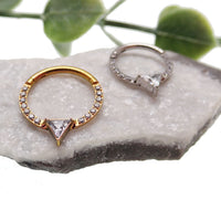 Hinged clicker body jewelry with triangle CZ, 16g, made by Body Clickers, featuring an 8mm design and secure clasp.