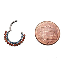 Orange and blue CZ titanium clicker body jewelry, 16g, with 8mm diameter, from Body Clickers.