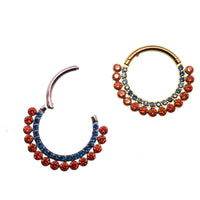 Orange and blue CZ titanium clicker body jewelry in 16g with 8mm diameter, featuring vibrant color accents and a sleek design.