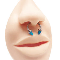 Peacock blue 4mm cone horseshoe piercing in 14g body jewelry by Body Clickers, shown on a model.