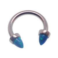 Peacock blue 4mm cone horseshoe piercing in 14g body jewelry by Body Clickers, showing the curved horseshoe design.