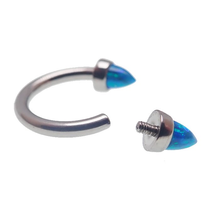 Peacock blue 4mm cone horseshoe piercing in 14g Body Clickers body jewelry, showing the vibrant curved design and shiny finish.