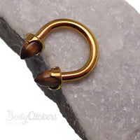Titanium circular tiger's eye body jewelry with 8mm diameter and 14g gauge, featuring a polished tiger's eye stone.