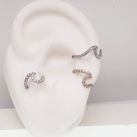 Titanium Wave & CZ Clicker body jewelry in 16g with 8mm wave design by Body Clickers, featuring sparkling cubic zirconia accents.