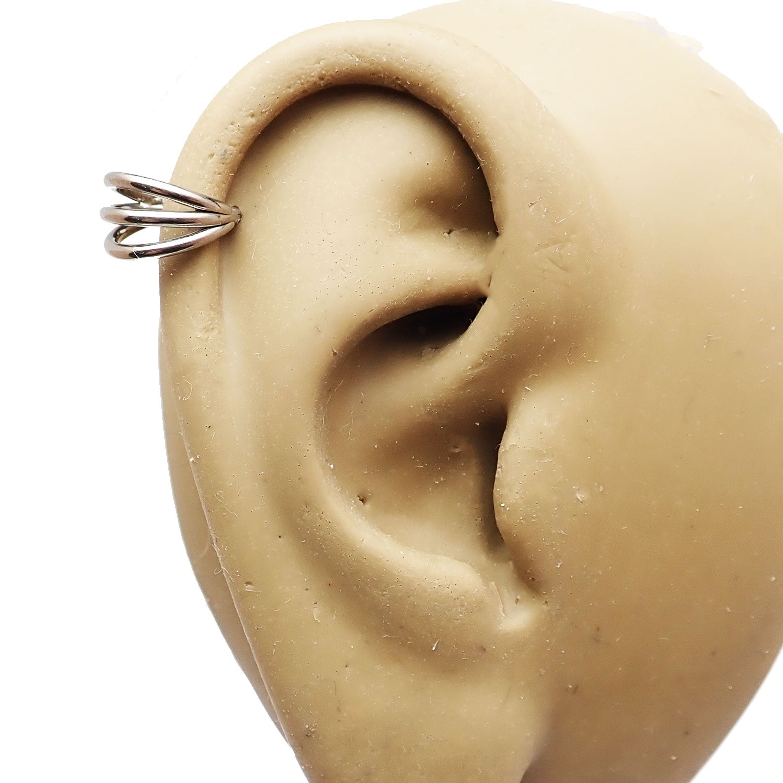 Tri-hoop titanium clicker body jewelry by Body Clickers, 16g, with 8mm hoops and sleek, modern design.