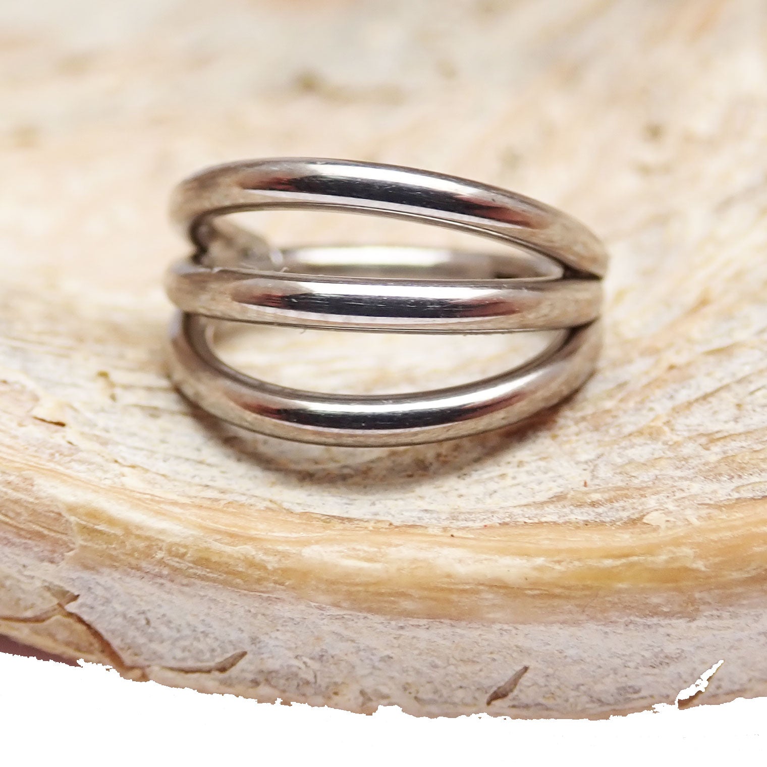 Tri-Hoop Titanium Clicker 16g body jewelry by Body Clickers with an 8mm diameter and clicker closure.
