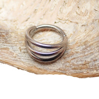 Tri-Hoop Titanium Clicker body jewelry, 16g, with 8mm hoops, by Body Clickers, showcasing a stylish and durable design.
