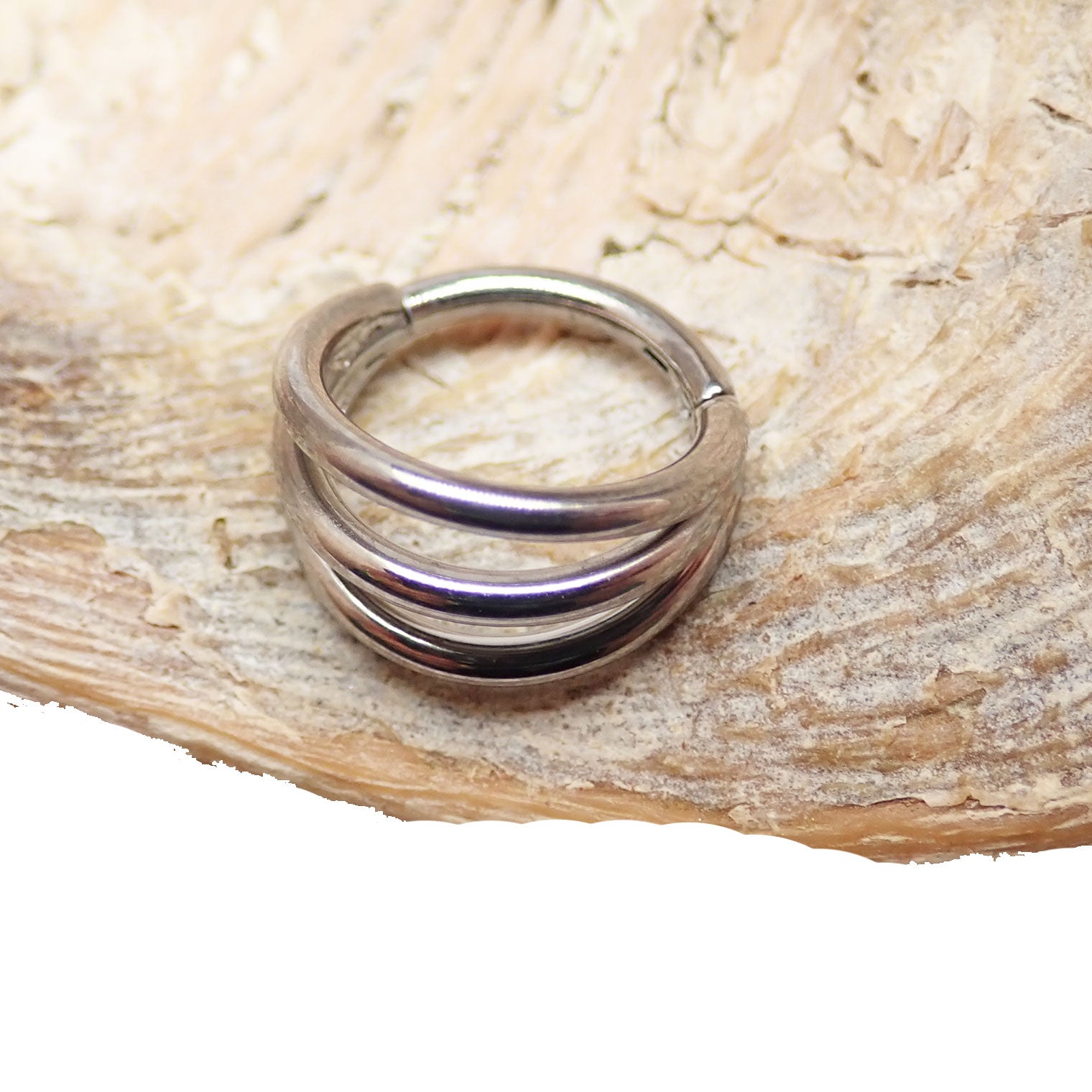 Tri-Hoop Titanium Clicker body jewelry, 16g, with 8mm hoops, by Body Clickers, showcasing a stylish and durable design.