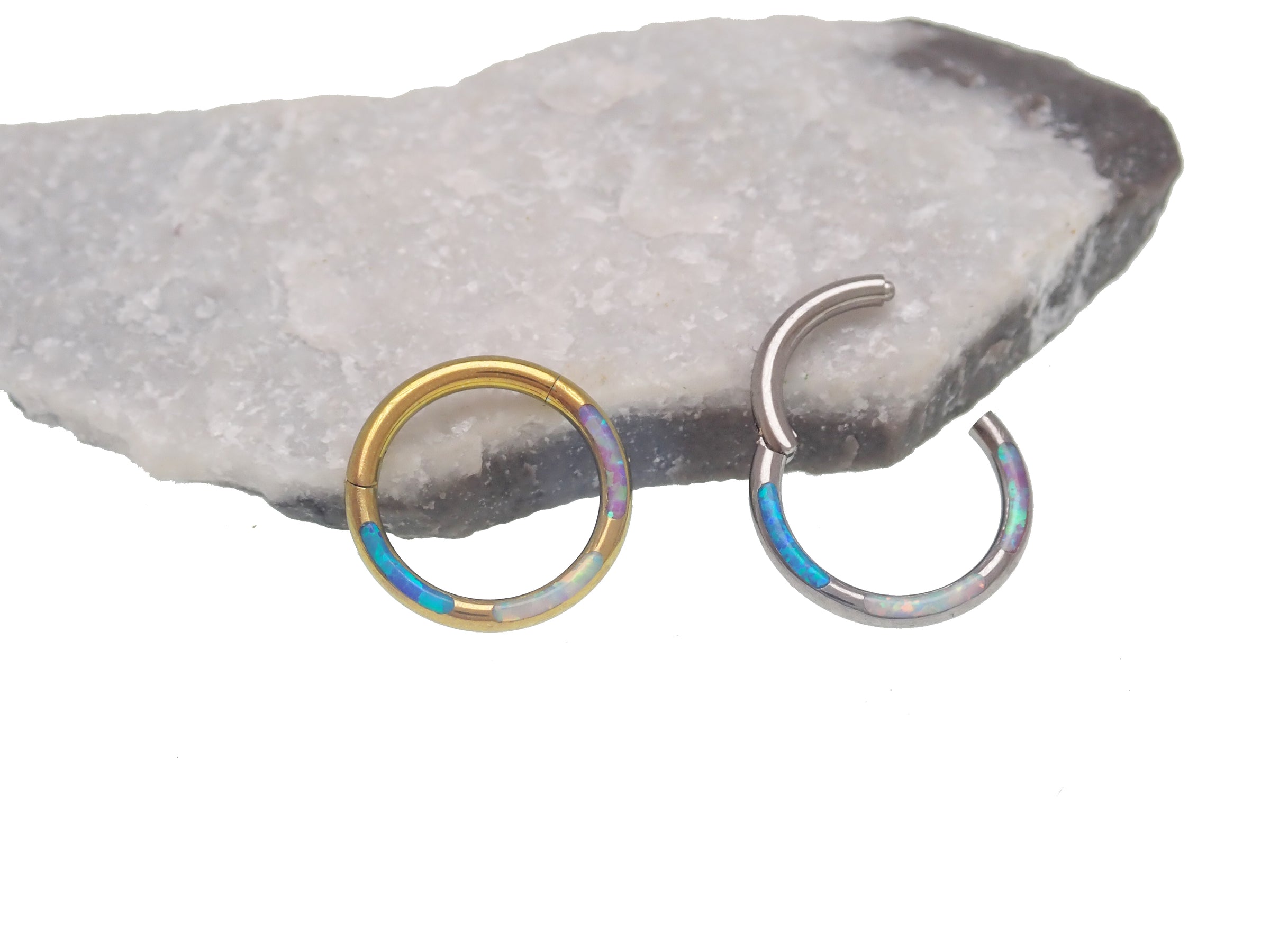 Tri-Opal inlaid titanium clicker body jewelry in 16g with 8mm diameter, featuring a sleek design and vibrant opal accents.
