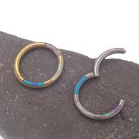 Tri-Opal inlaid titanium clicker body jewelry, 16g, with 8mm diameter, featuring colorful opal inlay and sleek titanium design.