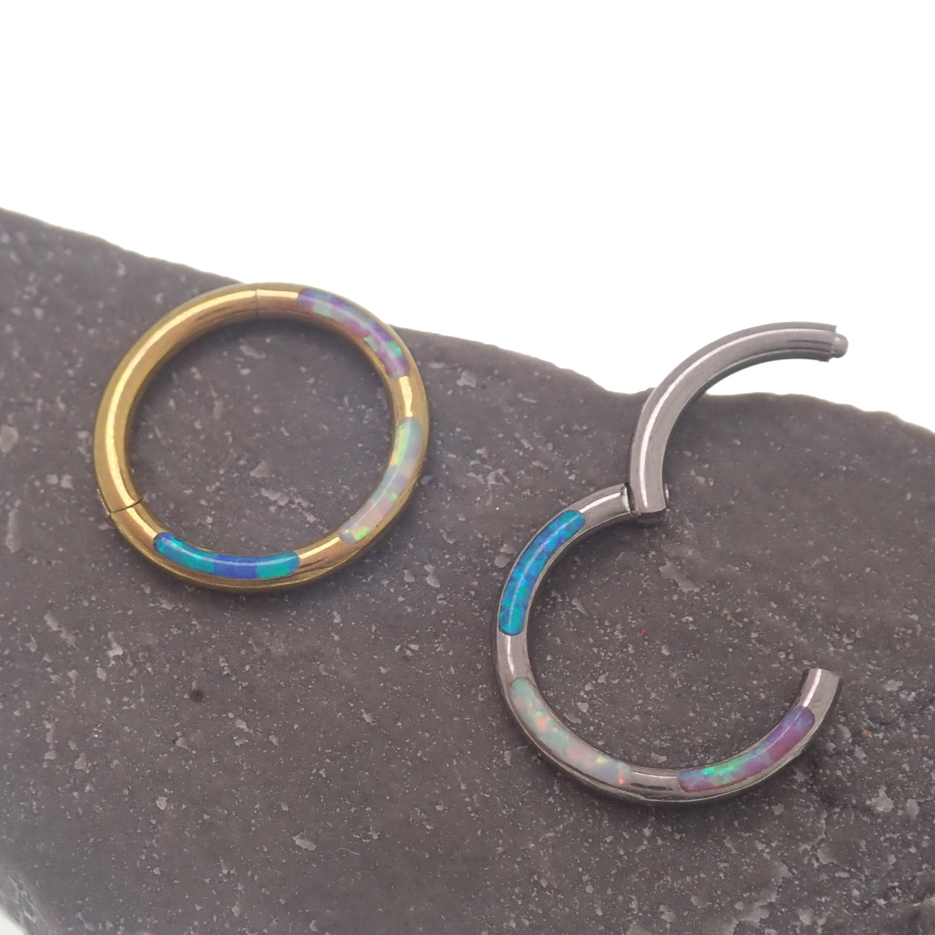 Tri-Opal inlaid titanium clicker body jewelry, 16g, with 8mm diameter, featuring colorful opal inlay and sleek titanium design.