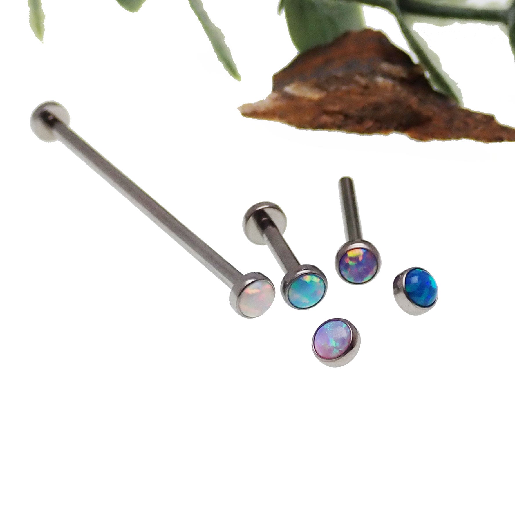 Titanium straight barbell body jewelry with flat opal ends, 16g, by Body Clickers, featuring a sleek, modern design with vibrant blue accents.