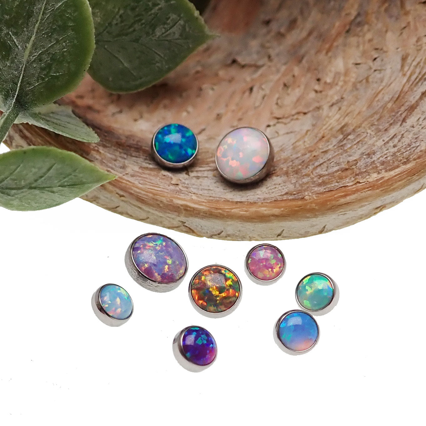 Body Clickers 16g cabochon opal titanium body jewelry top, featuring vibrant opal gemstone on sleek titanium setting.