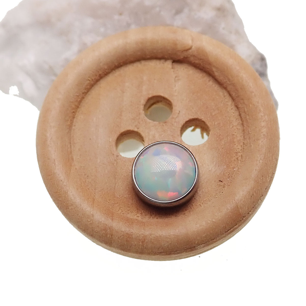 White cabochon opal top body jewelry by Body Clickers, 16g, featuring a smooth, polished opal gemstone for body piercing accessories.